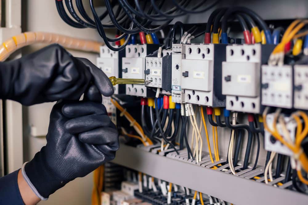 Electrician-Inspecting-An-Electrical-Cabinet